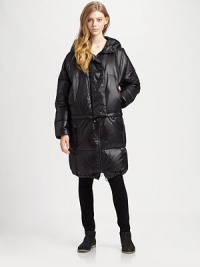 Modern puffer design has an attached hood and a center panel that can be unzipped for a shorter silhouette. Attached hoodSnap closuresLong sleevesZippered slash pocketsCenter panel can be unzipped for a shorter styleFully linedAbout 36 from shoulder to hemNylon; down fillDry cleanMade in ItalyModel shown is 5'10 (177cm) wearing US size 2. Modern puffer design has an attached hood and a center panel that can be unzipped for a shorter silhouette. Attached hoodSnap closuresLong sleevesZippered slash pocketsCenter panel can be unzipped for a shorter styleFully linedAbout 36 from shoulder to hemNylon; down fillDry cleanMade in ItalyModel shown is 5'10 (177cm) wearing US size 2.