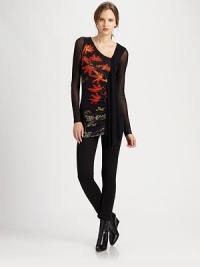 A lovely printed mesh top featuring an intriguing neckline, cascading ruffle front and sheer sleeves.Asymmetrical necklineSheer sleevesPrinted frontAbout 28 from shoulder to hemPolyamideDry cleanMade in Italy Model shown is 5'11 (180cm) wearing US size Small. A lovely printed mesh top featuring an intriguing neckline, cascading ruffle front and sheer sleeves.Asymmetrical necklineSheer sleevesPrinted frontAbout 28 from shoulder to hemPolyamideDry cleanMade in Italy Model shown is 5'11 (180cm) wearing US size Small.