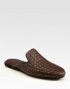Slide comfortably into this soft, shapely slipper of iconic woven Italian leather.Leather upperLeather liningPadded insoleSuede soleMade in Italy