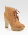 Lace-up silhouette of buttery suede, propped with a sturdy heel and platform for a casual-cool look. Foam heel, 4 (100mm)Foam platform, 1 (25mm)Compares to a 3 heel (75mm)Suede upperLeather lining and solePadded insoleImported