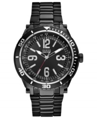 A modern watch from GUESS in a sporty silhouette and blacked out tones. A modern watch from GUESS in a sporty silhouette and blacked out tones.