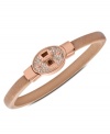 Subtle chic. Fossil's turn-lock bangle is crafted from rose gold-tone stainless steel with clear accents for a sparkling touch. Approximate diameter: 2-5/8 inch.