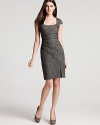 Black Halo lends a smart look with the Sorel dress in grey tweed, an office-ready style dressed up with leather details.