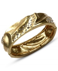 The worn-in look gets a sparkling upgrade! This Jones New York bracelet is styled with a textured surface embellished with crystal accents. Crafted in worn gold tone mixed metal. Approximate diameter: 2-1/2 inches. The worn-in look gets a sparkling upgrade! This Jones New York bracelet is styled with a textured surface embellished with crystal accents. Crafted in worn gold tone mixed metal. Approximate diameter: 2-1/2 inches.