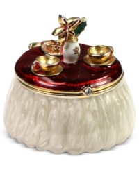 Setting up quite nicely. Jones New York's holiday keepsake box is crafted from mixed metal with epoxy details adding a special touch. Approximate width: 2 inches. Approximate length: 1 inch. Setting up quite nicely. Jones New York's holiday keepsake box is crafted from mixed metal with epoxy details adding a special touch. Approximate width: 2 inches. Approximate length: 1 inch.