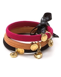 Pony up with this trio of hair elastics, adorned with MARC BY MARC JACOBS metal logo turnlock charms. Pony up with this trio of hair elastics, adorned with MARC BY MARC JACOBS metal logo turnlock charms.