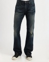 A fresh and modern update to the original Bootcut silhouette, 3D and hand sanded whiskers coupled with minimal griding on the pockets and hems give this wash a cool, masculine feel.Five-pocket styleInseam, about 34CottonMachine washMade in USA