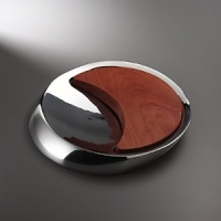 Since 1951 Nambe has been dedicated to crafting great designs of timeless beauty. The Eclipse Cheese Tray is 14 in diameter and a perfect addition to a wine and cheese party or casual gathering with friends. Since 1951 Nambe has been dedicated to crafting great designs of timeless beauty. The Eclipse Cheese Tray is 14 in diameter and a perfect addition to a wine and cheese party or casual gathering with friends.