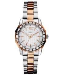 A feminine sport watch from GUESS that dazzles with crystal accents. A feminine sport watch from GUESS that dazzles with crystal accents.
