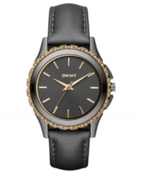 Dusky tones on rich leather blend with sparkling golden accents on this DKNY watch. Dusky tones on rich leather blend with sparkling golden accents on this DKNY watch.