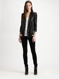 Cropped blazer with three-quarter sleeves, encrusted in glimmering sequins and finished with an asymmetrical cropped back hem. Notched shawl collarThree-quarter sleevesAsymmetrical cropped back hemAbout 27 from shoulder to hem at longest pointRayon/polyesterDry cleanImportedModel shown is 5'9 (176cm) wearing US size Small. Cropped blazer with three-quarter sleeves, encrusted in glimmering sequins and finished with an asymmetrical cropped back hem. Notched shawl collarThree-quarter sleevesAsymmetrical cropped back hemAbout 27 from shoulder to hem at longest pointRayon/polyesterDry cleanImportedModel shown is 5'9 (176cm) wearing US size Small.