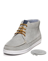 Fred Perry brings skater style to the classic chukka. This suede shoe sports a wide profile, moc toe and cool contrast lace detail. Fred Perry brings skater style to the classic chukka. This suede shoe sports a wide profile, moc toe and cool contrast lace detail.