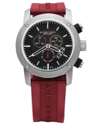 This Burberry timepiece features a red rubber strap and round silvertone stainless steel case. Round black dial with three subdials, date window, logo and stick indices. Swiss movement. Water resistant to 100 meters. Two-year limited warranty. This Burberry timepiece features a red rubber strap and round silvertone stainless steel case. Round black dial with three subdials, date window, logo and stick indices. Swiss movement. Water resistant to 100 meters. Two-year limited warranty.