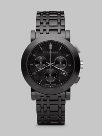 Signature checks define a stainless steel chronograph design with Swiss quartz movement on a ceramic link bracelet. Round bezel Quartz movement Three-eye chronograph functionality Water resistant to 5 ATM Date function at 4 o'clock Second hand Stainless steel case: 40mm (1.57) Ceramic bracelet: 20mm (0.79) Made in Switzerland Signature checks define a stainless steel chronograph design with Swiss quartz movement on a ceramic link bracelet. Round bezel Quartz movement Three-eye chronograph functionality Water resistant to 5 ATM Date function at 4 o'clock Second hand Stainless steel case: 40mm (1.57) Ceramic bracelet: 20mm (0.79) Made in Switzerland