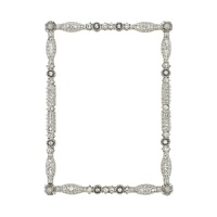 This meticulously detailed frame is accented with dozens of hand-set Swarovski® crystals and beads. This meticulously detailed frame is accented with dozens of hand-set Swarovski® crystals and beads.