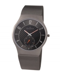 Ready to withstand the elements, this titanium design by Skagen Denmark emanates contemporary appeal. Titanium mesh bracelet and round case. Gray carbon fiber dial features numerals and stick indices at markers, orange-accented second subdial at six o'clock, luminous orange hour and minute hands and logo at twelve o'clock. Quartz movement. Water resistant to 30 meters. Limited lifetime warranty. Ready to withstand the elements, this titanium design by Skagen Denmark emanates contemporary appeal. Titanium mesh bracelet and round case. Gray carbon fiber dial features numerals and stick indices at markers, orange-accented second subdial at six o'clock, luminous orange hour and minute hands and logo at twelve o'clock. Quartz movement. Water resistant to 30 meters. Limited lifetime warranty.