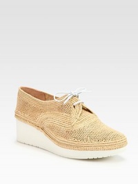 Elevated silhouette of breathable crochet raffia with smooth leather laces. Rubber wedge, 1½ (40mm)Rubber platform, ½ (15mm)Compares to a 1 heel (25mm)Crochet raffia upper with leather lacesLeather liningRubber solePadded insoleMade in France Elevated silhouette of breathable crochet raffia with smooth leather laces. Rubber wedge, 1½ (40mm)Rubber platform, ½ (15mm)Compares to a 1 heel (25mm)Crochet raffia upper with leather lacesLeather liningRubber solePadded insoleMade in France