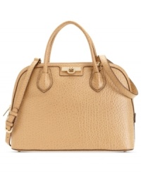 Add a little more luxe to your life with this irresistible silhouette from DKNY. Crafted in the softest leather and adorned with high-shine golden hardware, it lends a feeling of instant elegance, while pockets and zipped compartments offer superb organization within. Add a little more luxe to your life with this irresistible silhouette from DKNY. Crafted in the softest leather and adorned with high-shine golden hardware, it lends a feeling of instant elegance, while pockets and zipped compartments offer superb organization within.