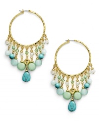 Think spring. The pastel combination of reconstituted turquoise, freshwater pearls (4 mm), and jade-colored beads exude serenity on the Green Valley hoop earrings from Lauren by Ralph Lauren. Setting and click-it clasp crafted in gold tone mixed metal. Approximate drop: 3 inches. Approximate diameter: 1-1/4 inches.