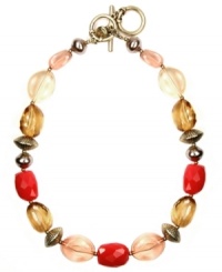 Natural beauty. Jones New York blends pink, amber, coral, and cream-colored plastic beads for an organically-chic necklace. Beaded accents and toggle clasp set in mixed metal. Approximate length: 17 inches + 2-inch extender.