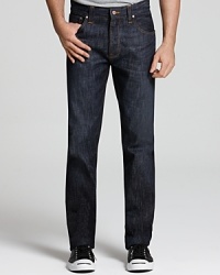 With a gradually tapered leg and a classic fit, this dark-rinse jean maintains a lean profile while remaining comfortable. Straight-slim leg opening. With a gradually tapered leg and a classic fit, this dark-rinse jean maintains a lean profile while remaining comfortable. Straight-slim leg opening.