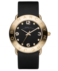 Make a splash with simple style. This iconic Marc by Marc Jacobs watch features a black leather strap and ion-plated goldtone stainless steel round case. Logo etched at bezel. Black dial with goldtone dot markers, numerals and logo. Quartz movement. Water resistant to 30 meters. Two-year limited warranty. Make a splash with simple style. This iconic Marc by Marc Jacobs watch features a black leather strap and ion-plated goldtone stainless steel round case. Logo etched at bezel. Black dial with goldtone dot markers, numerals and logo. Quartz movement. Water resistant to 30 meters. Two-year limited warranty.