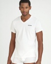 Smooth cotton with a hint of easy stretch and a logo accent on the chest. Cotton; machine wash Imported