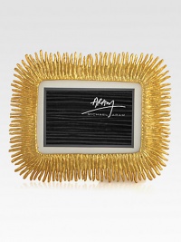 Showcase your most cherished photos in this exuberant, handcrafted frame.From the Flights of Fancy CollectionGold plateFits 8 X 10 photos13.5W X 11HImported
