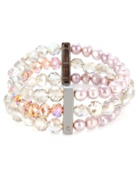 Pastel perfection! Light hues of lavender and lilac adorn this sweet three-row stretch bracelet from Kenneth Cole New York. Featuring imitation pearls and faceted glass beads, it's made in hematite tone mixed metal. The stretch design offers a comfortable, flexible fit. Approximate diameter: 2-1/2 inches. Pastel perfection! Light hues of lavender and lilac adorn this sweet three-row stretch bracelet from Kenneth Cole New York. Featuring imitation pearls and faceted glass beads, it's made in hematite tone mixed metal. The stretch design offers a comfortable, flexible fit. Approximate diameter: 2-1/2 inches.