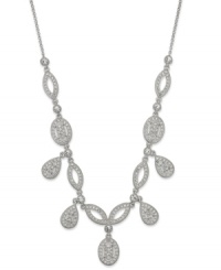 Eliot Danori's Windsor necklace catches eyes with teardrop, oval and marquise-shaped pendants embellished with sparkling glass crystal accents. Crafted in rhodium-plated silver tone mixed metal. Approximate length: 16 inches + 2-inch extender. Approximate drop: 3/4 inch. Eliot Danori's Windsor necklace catches eyes with teardrop, oval and marquise-shaped pendants embellished with sparkling glass crystal accents. Crafted in rhodium-plated silver tone mixed metal. Approximate length: 16 inches + 2-inch extender. Approximate drop: 3/4 inch.