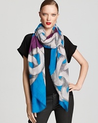 Plan your outfit around this bright blue and purple scarf from DIANE von FURSTENBERG, featuring an oversized chain print. Plan your outfit around this bright blue and purple scarf from DIANE von FURSTENBERG, featuring an oversized chain print.