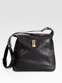 Sumptuous lambskin crafted in a slouchy silhouette with mini-studs and polished padlock hardware.Adjustable crossbody strap, 16-21½ dropTop zip closureOne outside open pocketOne inside open pocketLinen lining12½W X 12H X 4½DMade in Italy Sumptuous lambskin crafted in a slouchy silhouette with mini-studs and polished padlock hardware.Adjustable crossbody strap, 16-21½ dropTop zip closureOne outside open pocketOne inside open pocketLinen lining12½W X 12H X 4½DMade in Italy