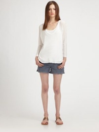 Semi-sheer, cotton-rich top has a plunging v-neck, split hi-low hem and dramatic dolman sleeves. Plunging v-neckDropped shouldersLong dolman sleevesSplit hi-low hem60% cotton/40% polyesterMachine washMade in USA of imported fabricModel shown is 5'10 (177cm) wearing US size Small. Semi-sheer, cotton-rich top has a plunging v-neck, split hi-low hem and dramatic dolman sleeves. Plunging v-neckDropped shouldersLong dolman sleevesSplit hi-low hem60% cotton/40% polyesterMachine washMade in USA of imported fabricModel shown is 5'10 (177cm) wearing US size Small.