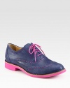 Candy-colored hues brighten this timeless leather oxford with wingtip details. Rubber heel, 1 (25mm)Leather upperLeather liningRubber solePadded insoleImported