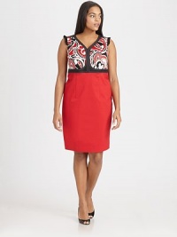 Beyond stunning, a lively abstract print couples perfectly with a classic silhouette with flattering Princess seams and Empire waist.V-necklineSleevelessRuffle detail on shouldersEmpire waistPrincess seamsSide zipperBack ventAbout 24 from natural waist62% cotton/33%nylon/5% spandexDry cleanMade in Italy