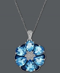 Fresh from the garden. Town & Country's fabulous flower pendant shines with the addition of pear-cut blue topaz (13-1/2 ct. t.w.) and a white topaz (1/2 ct. t.w.) center. Crafted in sterling silver. Approximate length: 18 inches. Approximate drop: 1-1/4 inches. Fresh from the garden. Town & Country's fabulous flower pendant shines with the addition of pear-cut blue topaz (13-1/2 ct. t.w.) and a white topaz (1/2 ct. t.w.) center. Crafted in sterling silver. Approximate length: 18 inches. Approximate drop: 1-1/4 inches.