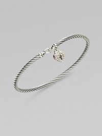 From the Cable Collectibles Collection. Signature sterling silver cable band is adorned with a delicate diamond heart lock for a memorable keepsake.Diamond, 0.14 tcw Sterling silver Width, about 3mm Hook closure Imported From the Cable Collectibles Collection. Signature sterling silver cable band is adorned with a delicate diamond heart lock for a memorable keepsake.Diamond, 0.14 tcw Sterling silver Width, about 3mm Hook closure Imported