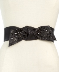 The softer side of rocker-chic, this rhinestone-studded stretch belt from Vince Camuto is bedecked with a bow for flirty, feminine appeal. The softer side of rocker-chic, this rhinestone-studded stretch belt from Vince Camuto is bedecked with a bow for flirty, feminine appeal.