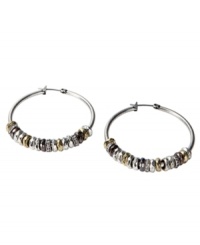 Effortlessly boho-cool, these Fossil earrings are a must-have for your collection. Crystal-accented multitone mixed metal rondelle beads shimmy and shake around these hoops. Approximate diameter: 1-1/2 inches. Effortlessly boho-cool, these Fossil earrings are a must-have for your collection. Crystal-accented multitone mixed metal rondelle beads shimmy and shake around these hoops. Approximate diameter: 1-1/2 inches.