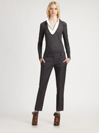 This clever wool pullover is embellished with a crisp, cotton inset to give the illusion of perfectly paired separates.Stand collarButton frontIllusion U necklineLong, cuffed sleevesInset: cottonBody: woolDry cleanMade in Italy of imported fabricModel shown is 5'11 (180cm) wearing US size Small. This clever wool pullover is embellished with a crisp, cotton inset to give the illusion of perfectly paired separates.Stand collarButton frontIllusion U necklineLong, cuffed sleevesInset: cottonBody: woolDry cleanMade in Italy of imported fabricModel shown is 5'11 (180cm) wearing US size Small.