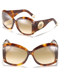 Ultimately chic, these square rounded oversized sunglasses are a must-have accessory for summertime fun. Ultimately chic, these square rounded oversized sunglasses are a must-have accessory for summertime fun.