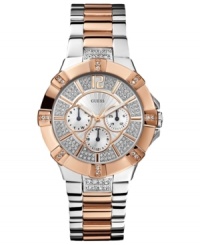 A shimmering sport watch in rosy hues from GUESS. A shimmering sport watch in rosy hues from GUESS.