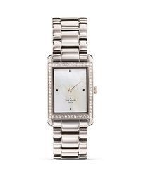 Take an uptown approach to accessorizing with this gold-plated watch from kate spade new york. It's rectangular design is city chic, while a glitzy bezel and silver band adds glamor.