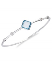 Bangle love. You'll adore Victoria Townsend's sterling silver bangle, with its square-cut blue topaz (3-1/4 ct. t.w.) and sparkling diamond accents. Approximate circumference: 8 inches. Bangle love. You'll adore Victoria Townsend's sterling silver bangle, with its square-cut blue topaz (3-1/4 ct. t.w.) and sparkling diamond accents. Approximate circumference: 8 inches.