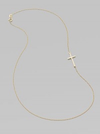 A wispy chain of 14k yellow gold features a cross pendant set askew for a modern edge.14k yellow gold Length, about 16 Pendant length, about ¾ Spring ring clasp Made in USA A wispy chain of 14k yellow gold features a cross pendant set askew for a modern edge.14k yellow gold Length, about 16 Pendant length, about ¾ Spring ring clasp Made in USA
