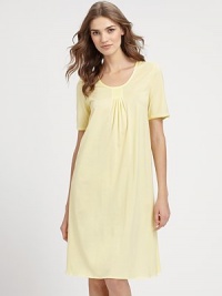 Lightweight design of pure cotton with subtle satin detailing adds a touch of glamor to comfortable nightwear. ScoopneckShort sleevesCenter satin appliqué with front pleatsSatin trim at neckline and sleevesA-lineAbout 39 from shoulder to hemMercerized cottonMachine washImported Lightweight design of pure cotton with subtle satin detailing adds a touch of glamor to comfortable nightwear. ScoopneckShort sleevesCenter satin appliqué with front pleatsSatin trim at neckline and sleevesA-lineAbout 39 from shoulder to hemMercerized cottonMachine washImported