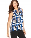 Layer your jackets and cardigans this season with Alfani's sleeveless plus size blouse, finished by a bold print.