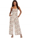 An allover abstract print adds a modern edge to this BCBGeneration wide-leg jumpsuit, perfect for chic day-to-night style!