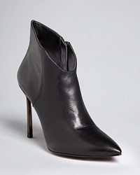 These Enzo Angiolini booties quickly get to the point of the new shape for basics, with sharp toes and stilettos topped off with strikingly slanted cuffs. These Enzo Angiolini booties quickly get to the point of the new shape for basics, with sharp toes and stilettos topped off with strikingly slanted cuffs.