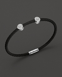 From the Celtic Noir Collection, a stackable bangle in white gold and black PVD cable with diamond stations. Designed by Charriol.